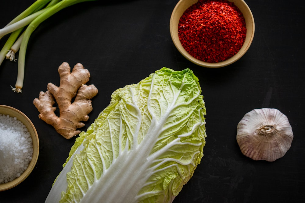 The ingredients for a kimchi: cabbage, ginger, spring onion, garlic, chilli flakes, salt