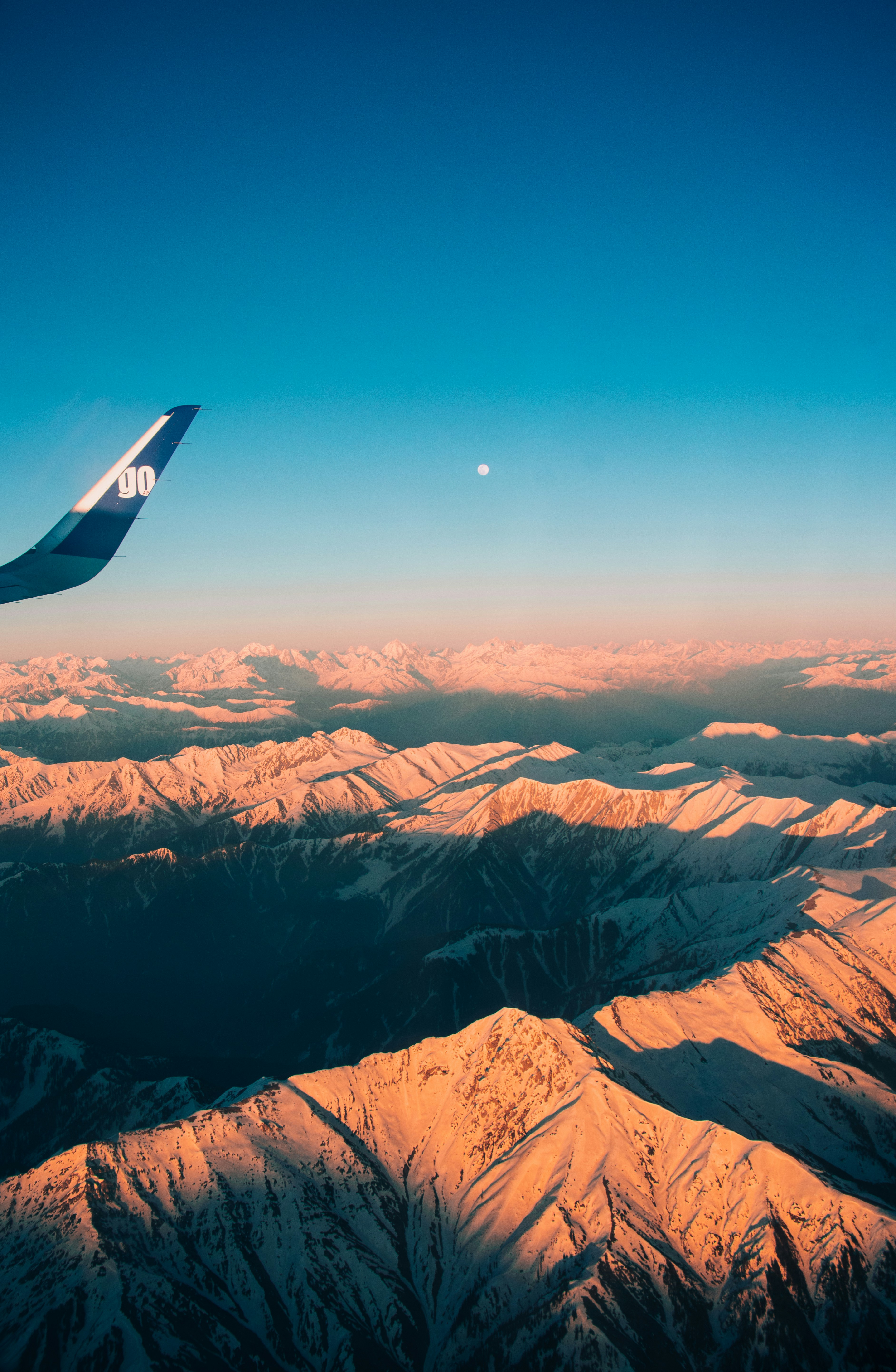 a view of the mountains from an airplane