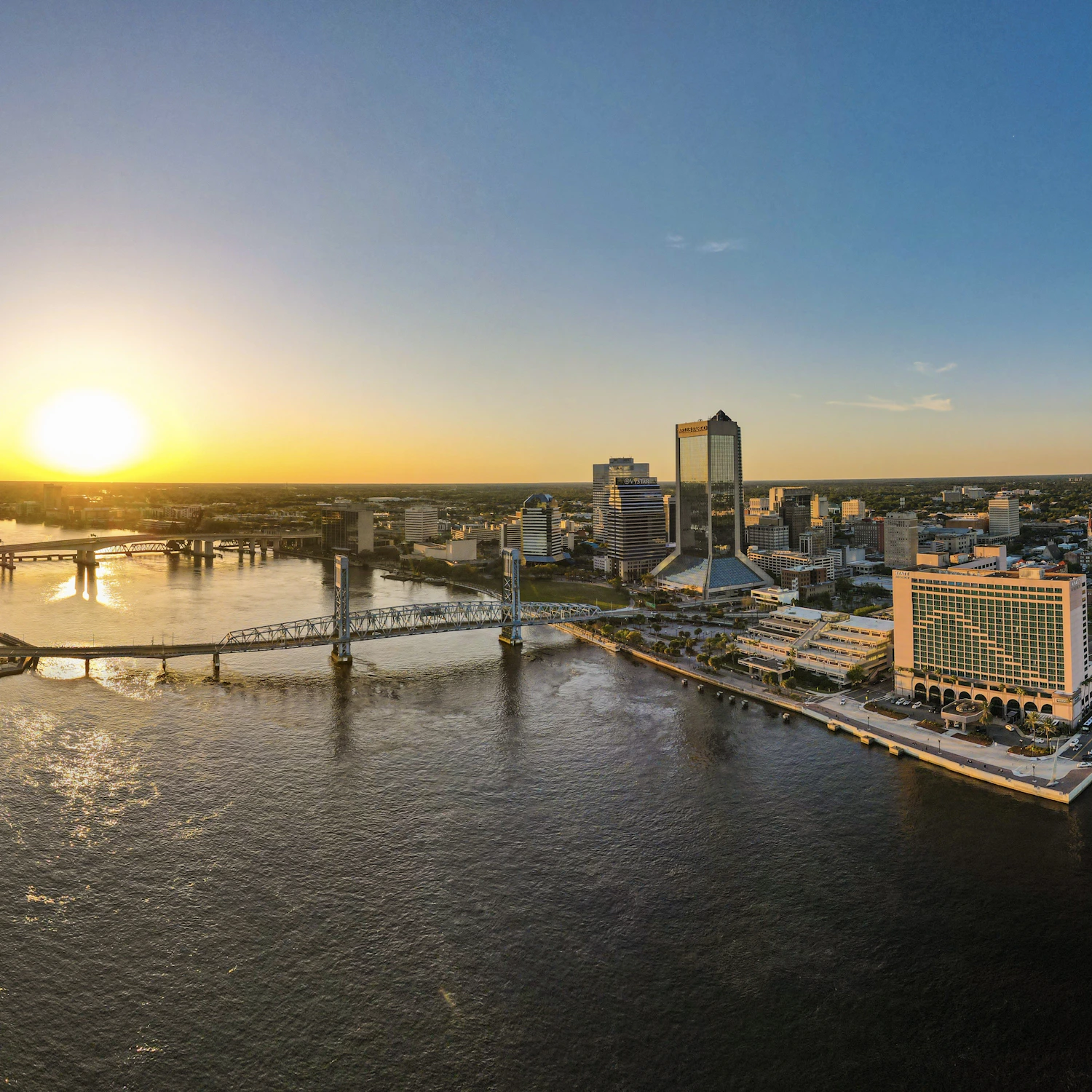 Downtown Jacksonville skyline and bridge at sunset