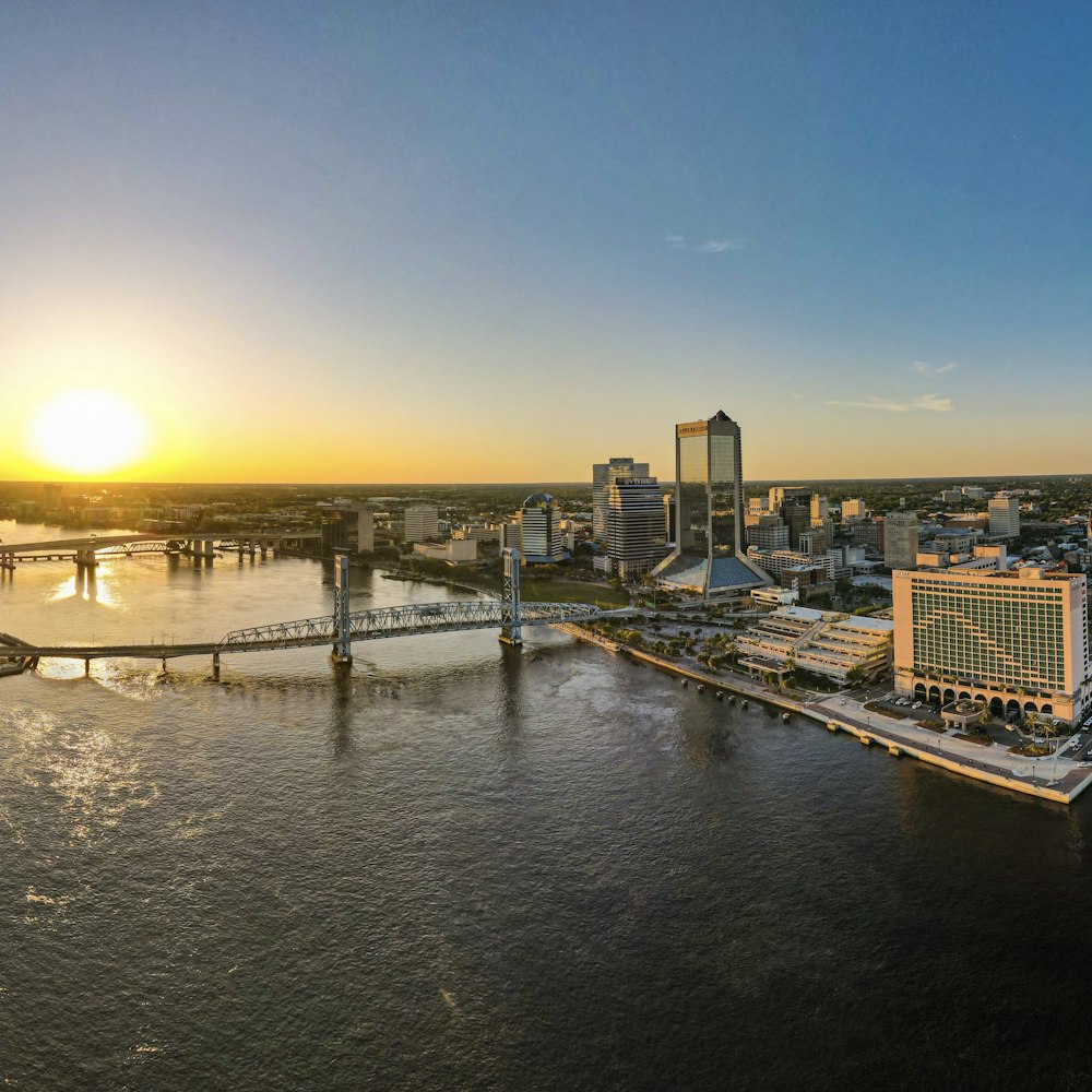 a large body of water with a city in the background