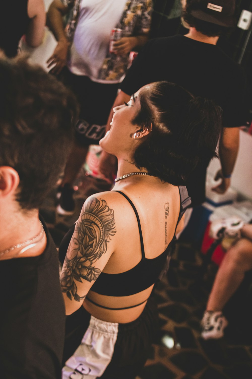 a woman with a tattoo on her back