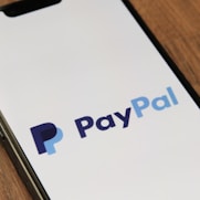 a phone with a pay pay logo on it