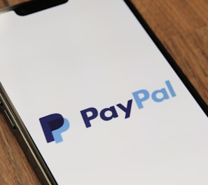 a phone with a pay pay logo on it