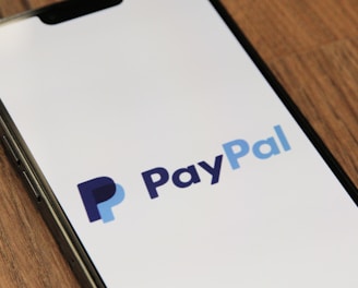 a phone with a pay pay logo on it