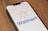 a close up of a cell phone on a table
