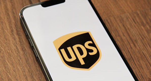 a phone with the ups logo on it