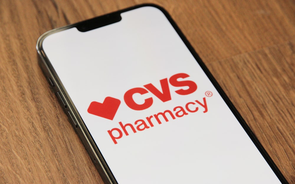 a cell phone with a cvs pharmacy logo on it