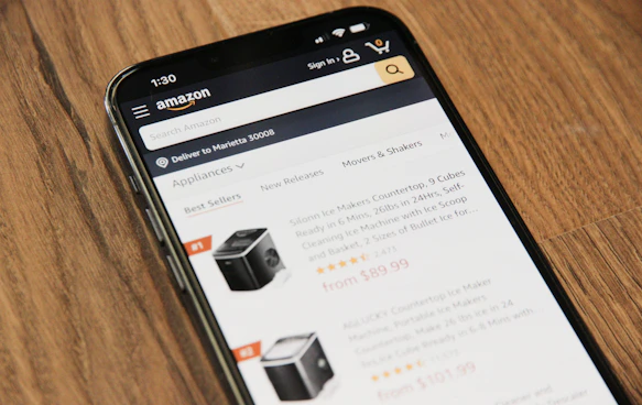 a cell phone sitting on top of a wooden table