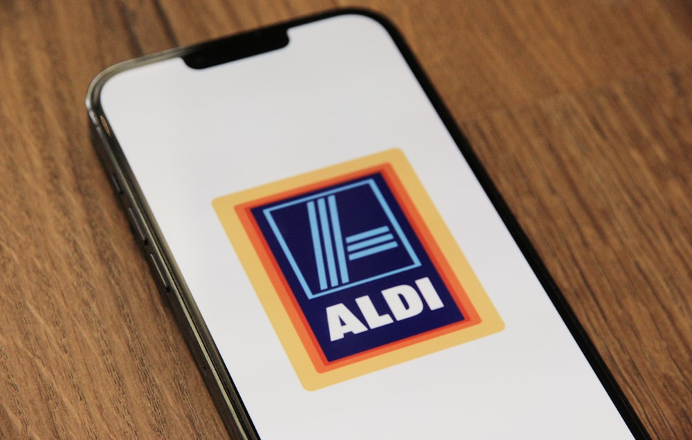 a cell phone with the aldi logo on it