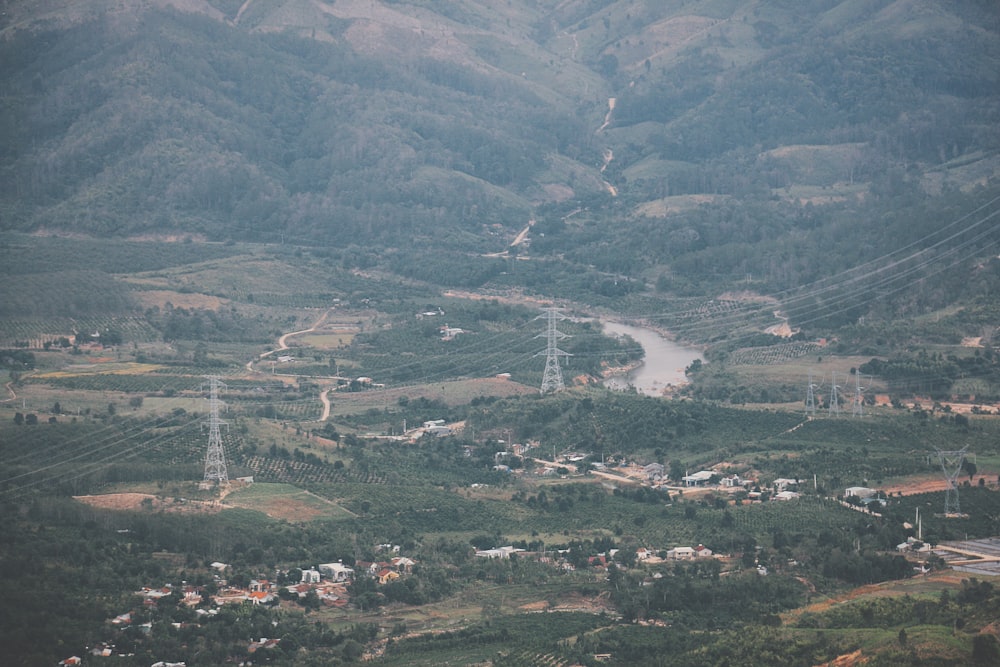 an aerial view of a valley with a river running through it