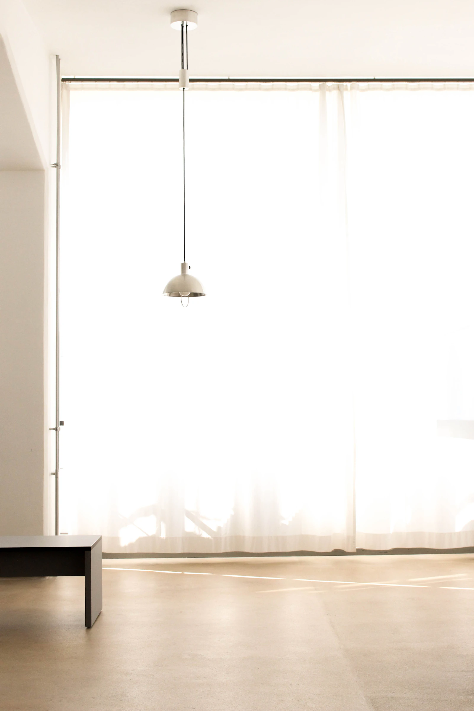 Bright uncluttered apartment room with space for quiet cardio equipment