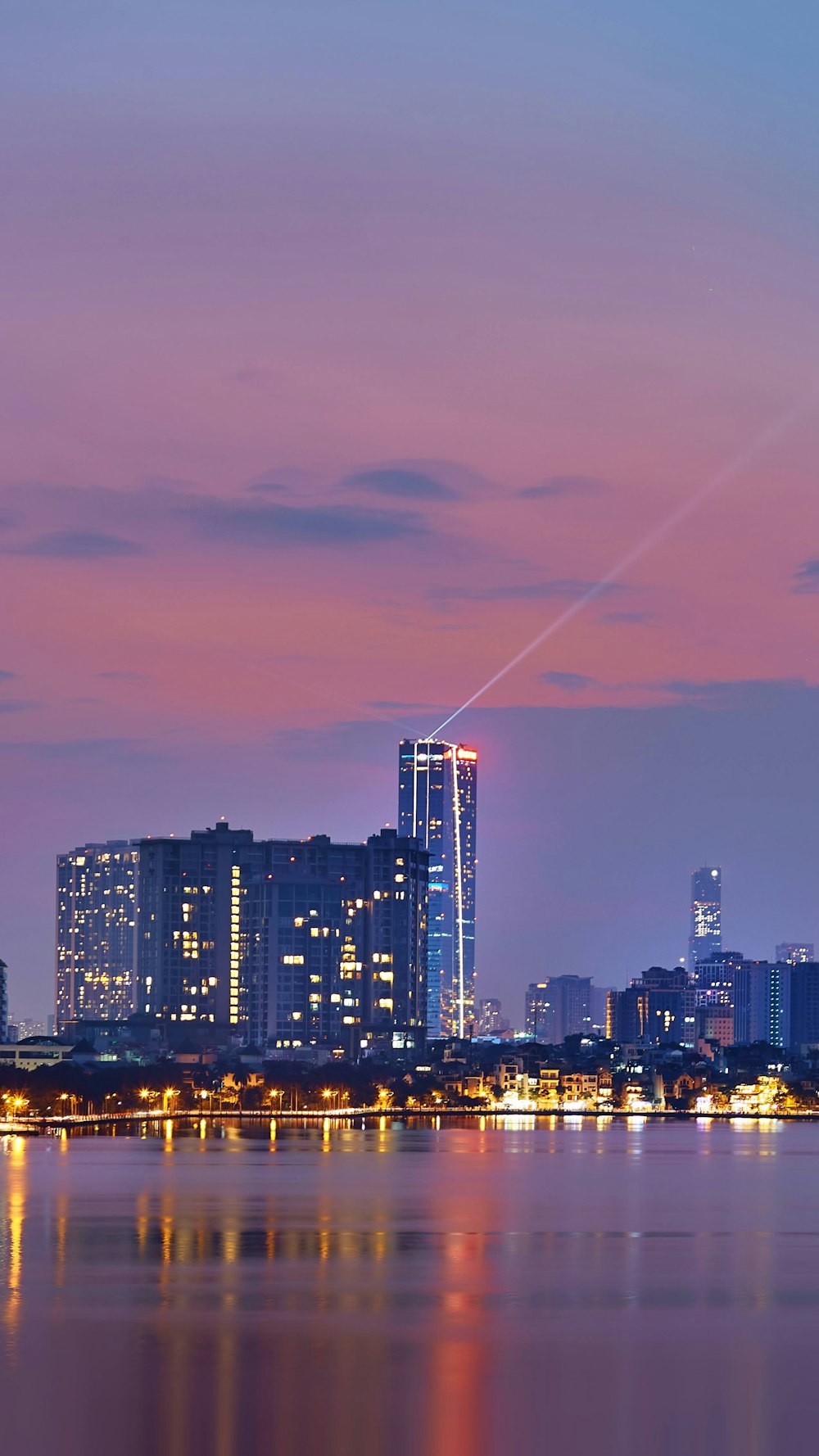 a view of a city at night from across the water