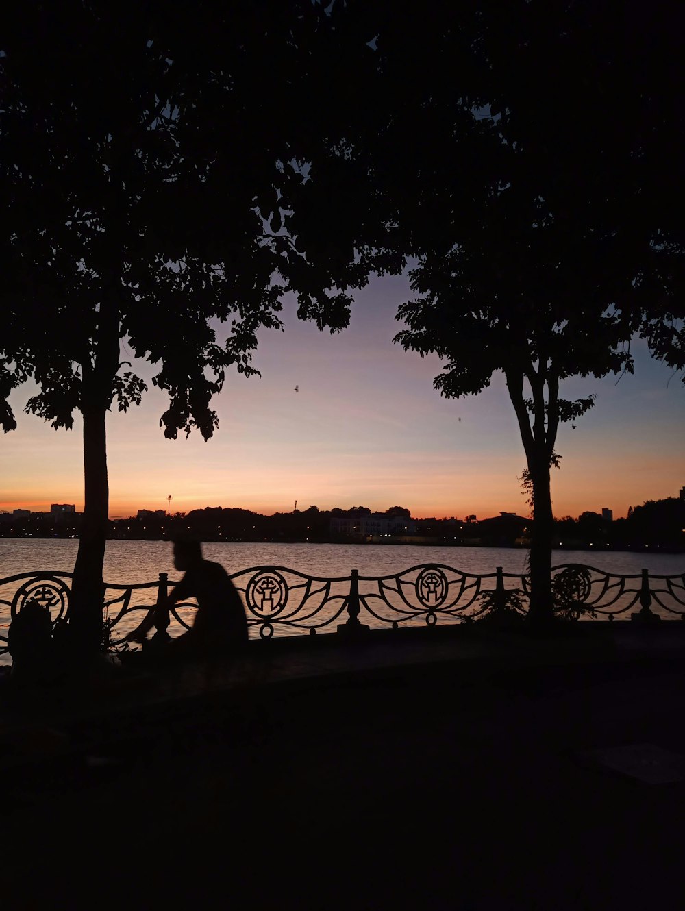 a sunset over a body of water