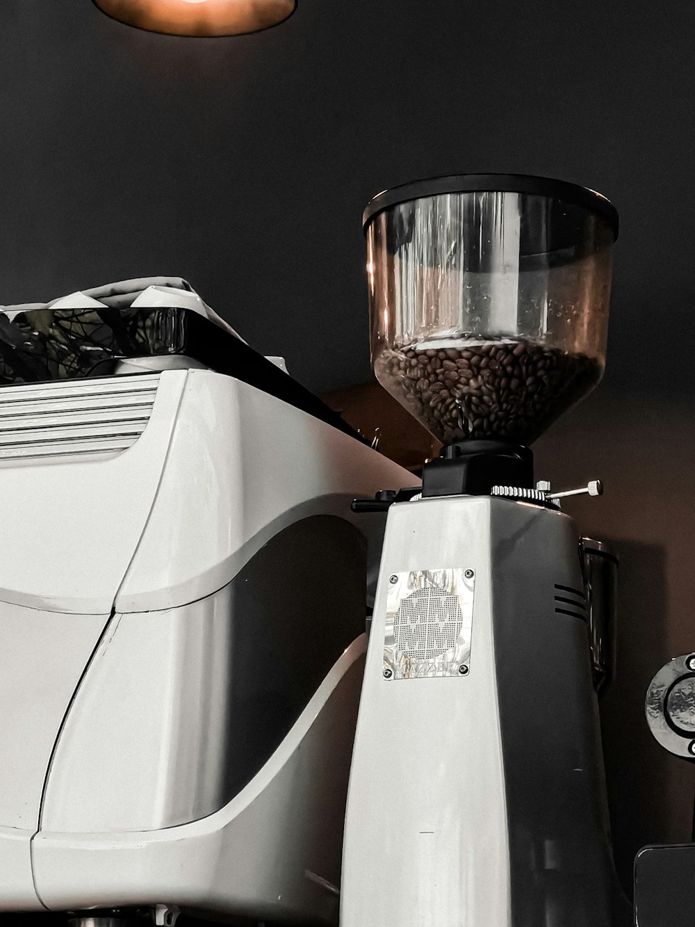 a coffee grinder sitting on top of a counter