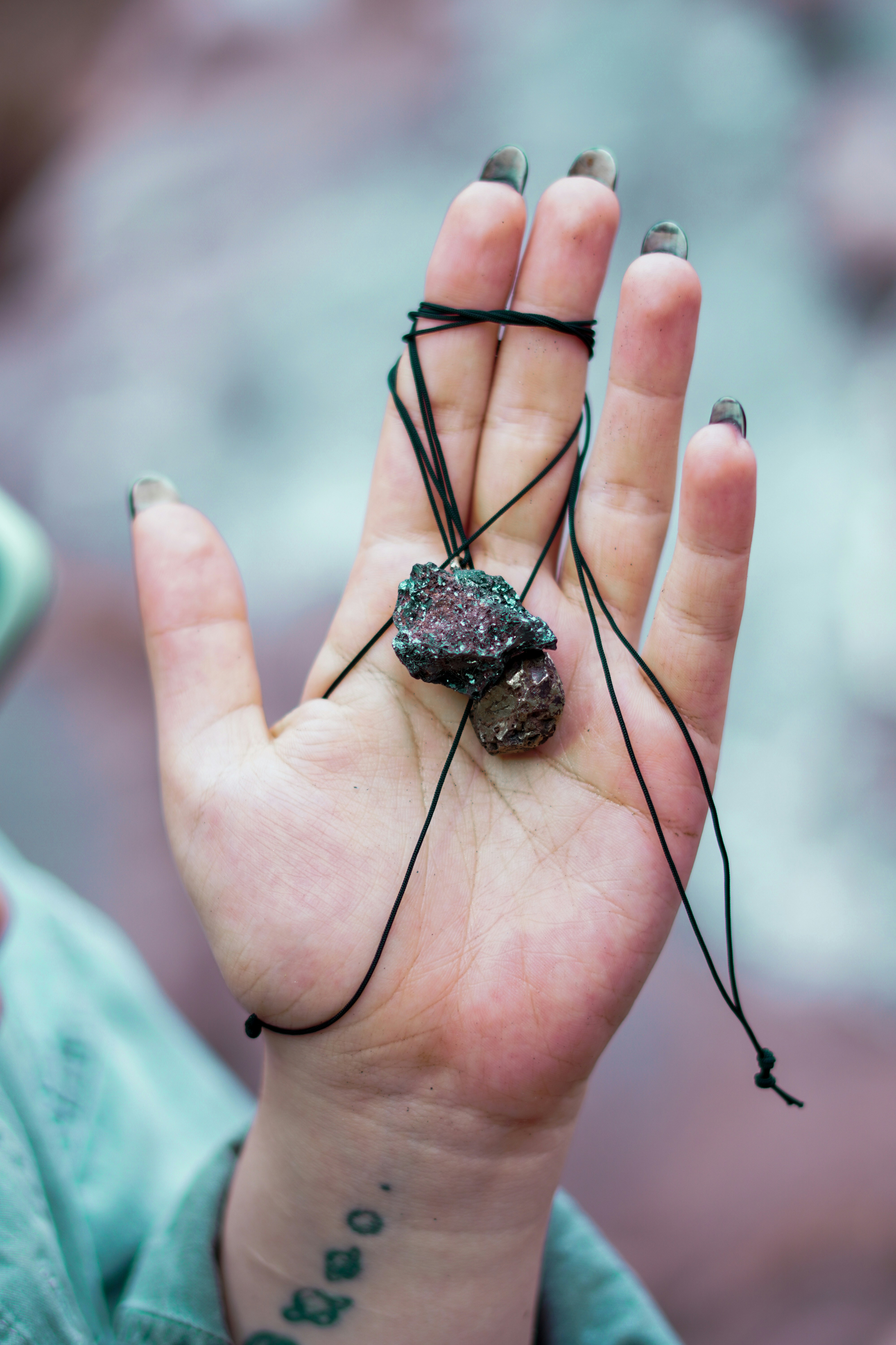 A person holding a rock in their hand photo – Free Stone Image on Unsplash