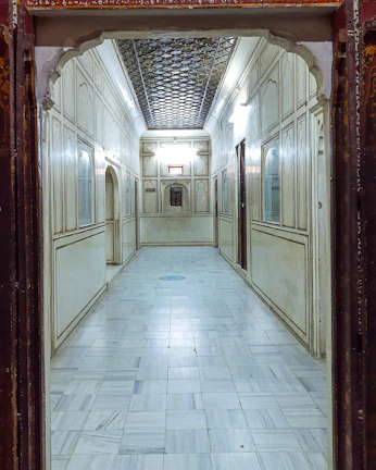 Interior hallway showcasing classic architectural details and warm tones.