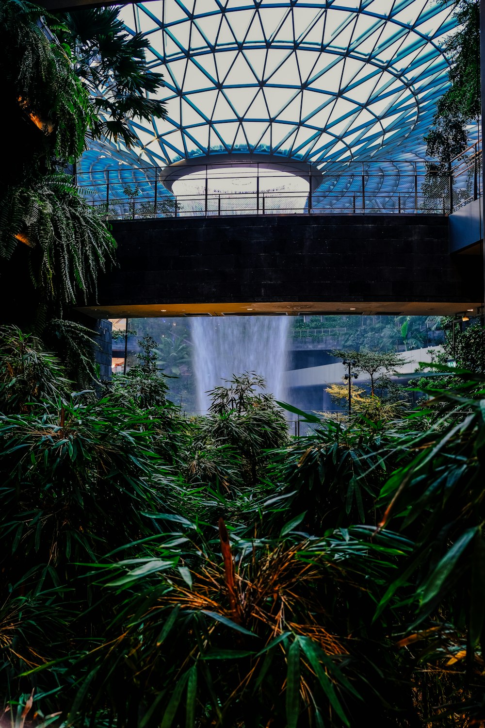 a view of the inside of a building with a waterfall