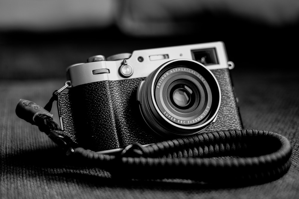 a black and white photo of a camera