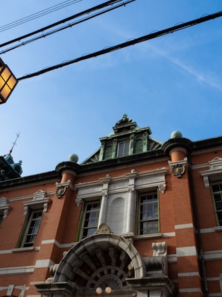 a building with a street light in front of it