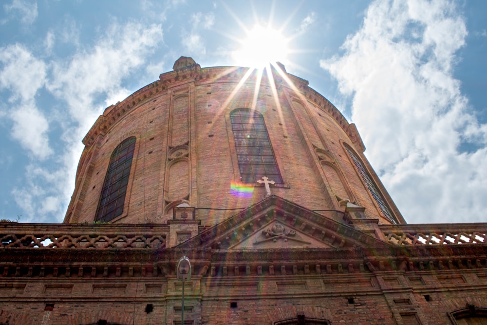 the sun shines brightly through the windows of a building