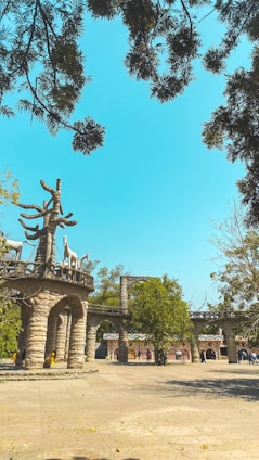 a statue in the middle of a park