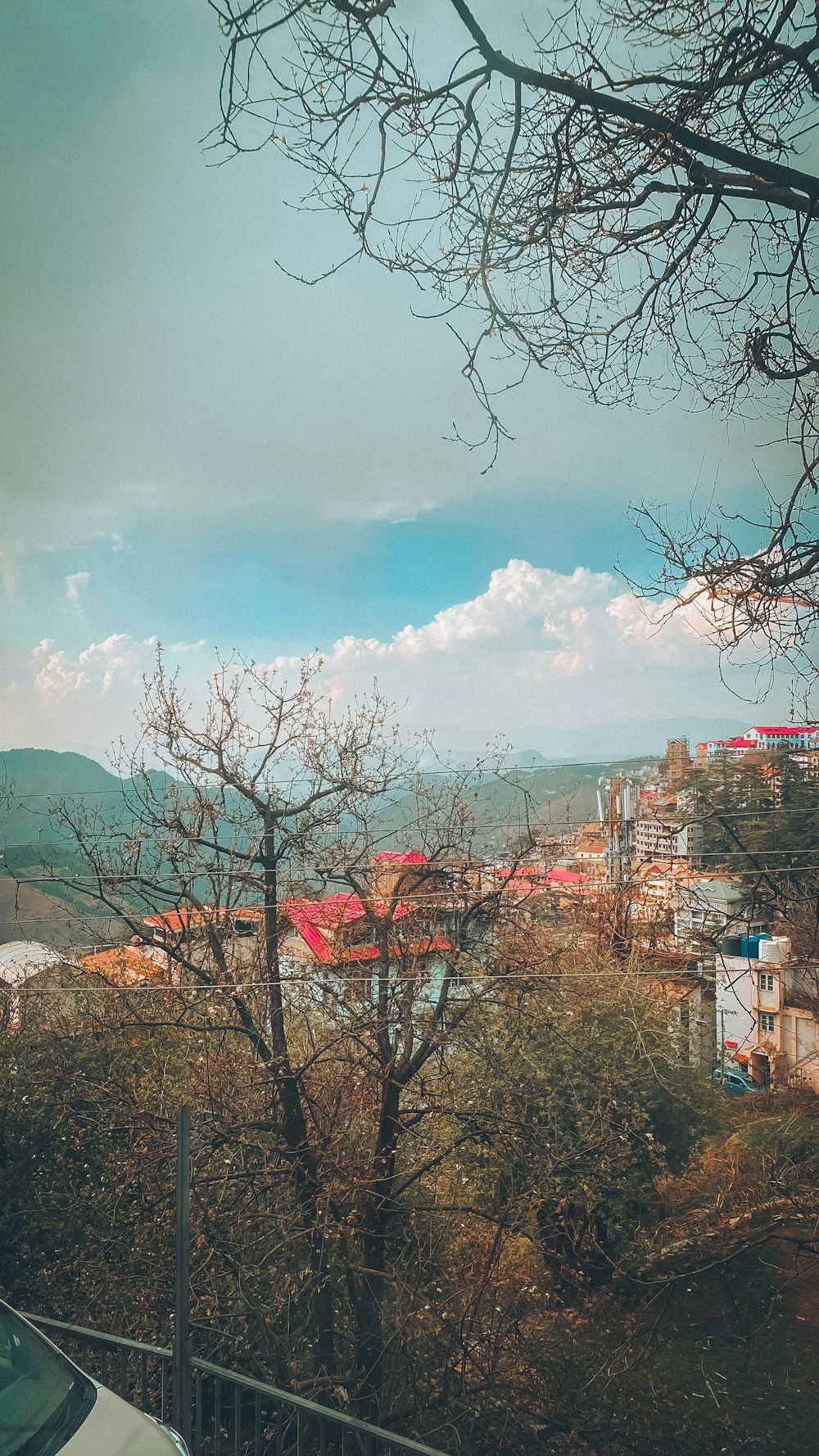 a view of a city from a hill top