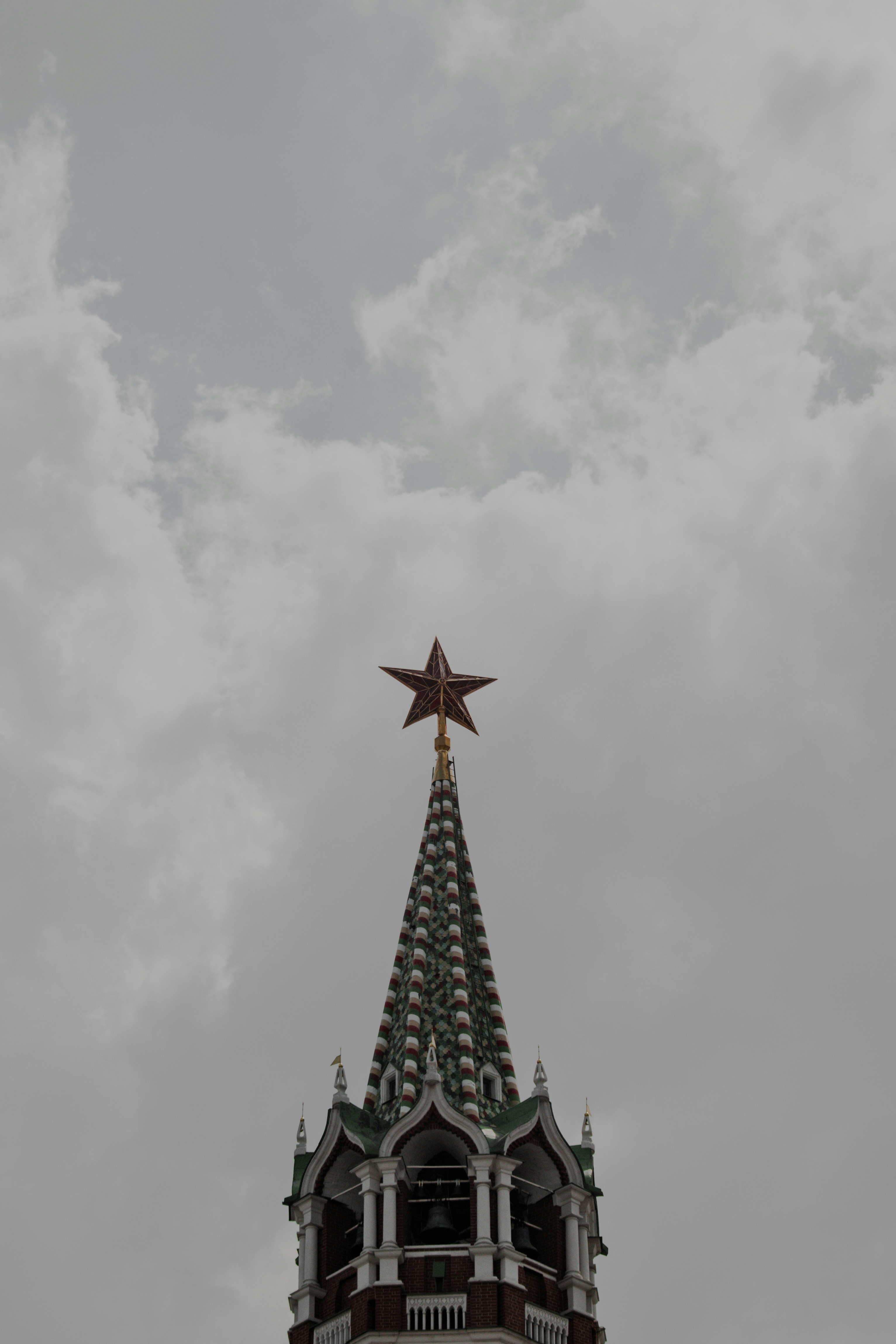 a tall tower with a star on top of it
