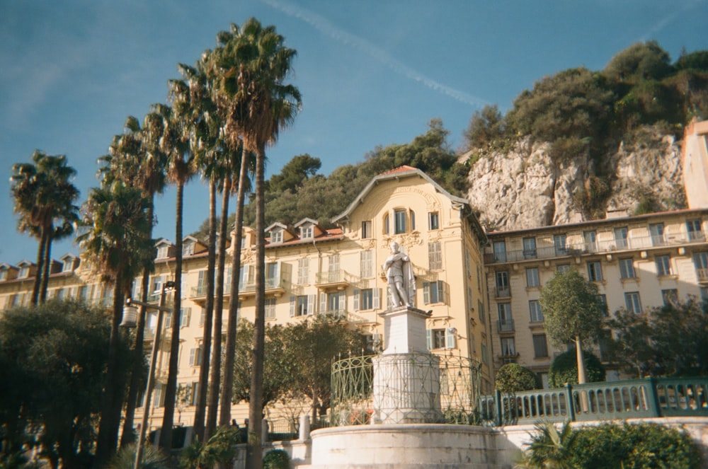 a building with a statue in front of it