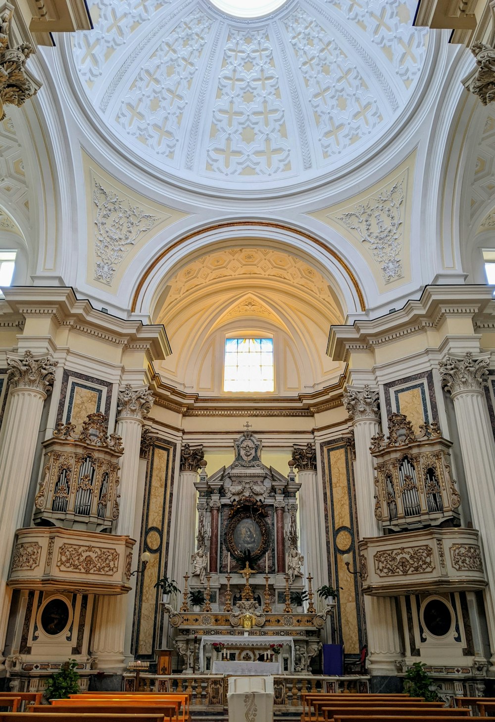 the inside of a church with high ceilings