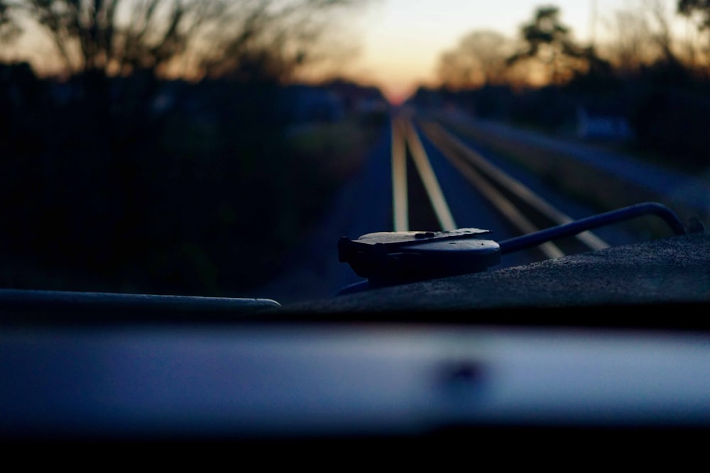a view of a train track from inside a vehicle