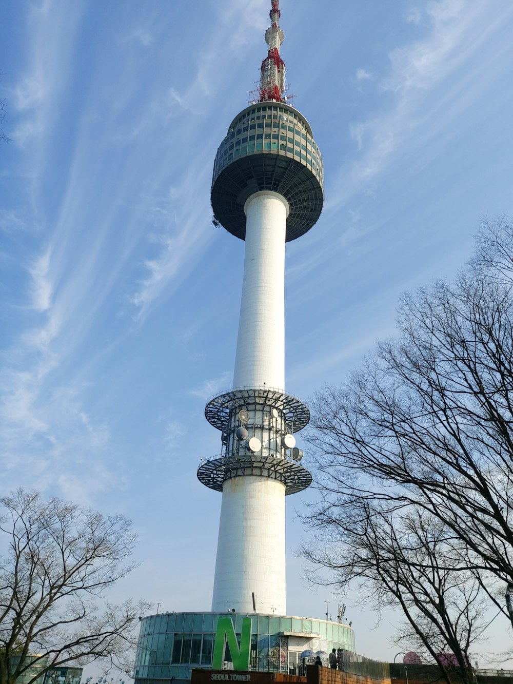 a tall white tower with a sky background