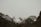 a mountain range covered in snow and clouds