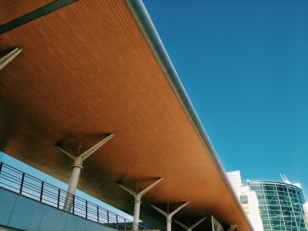 a view of a bridge with a building in the background