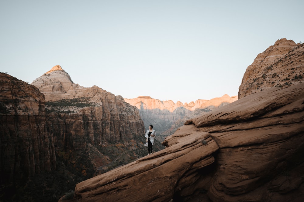 a person standing on top of a mountain