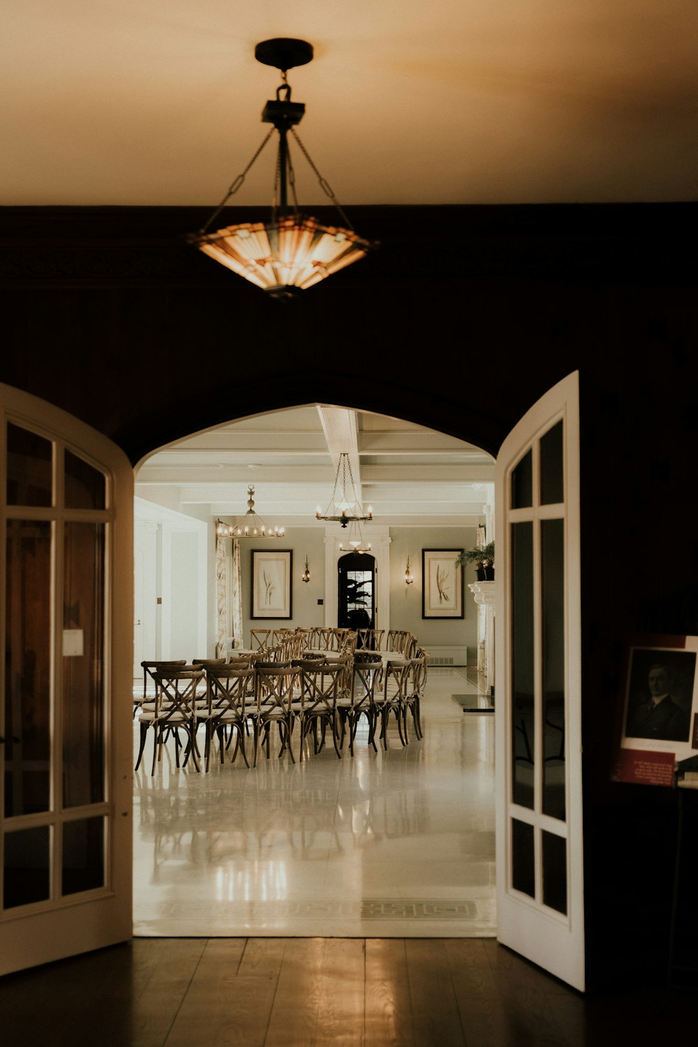 an open door leading into a dining room