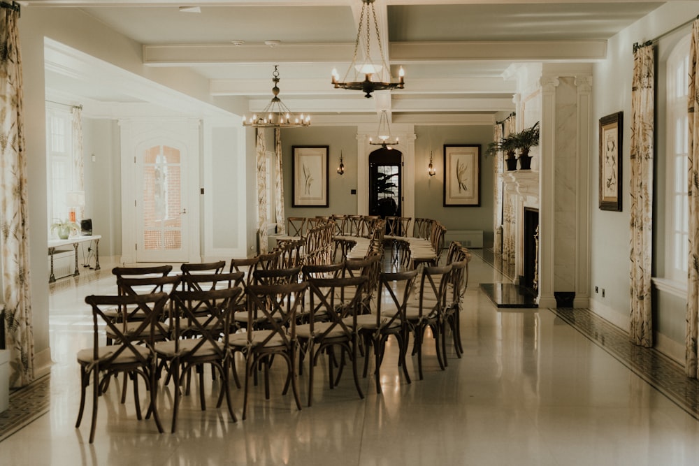 a large room with a long table and chairs