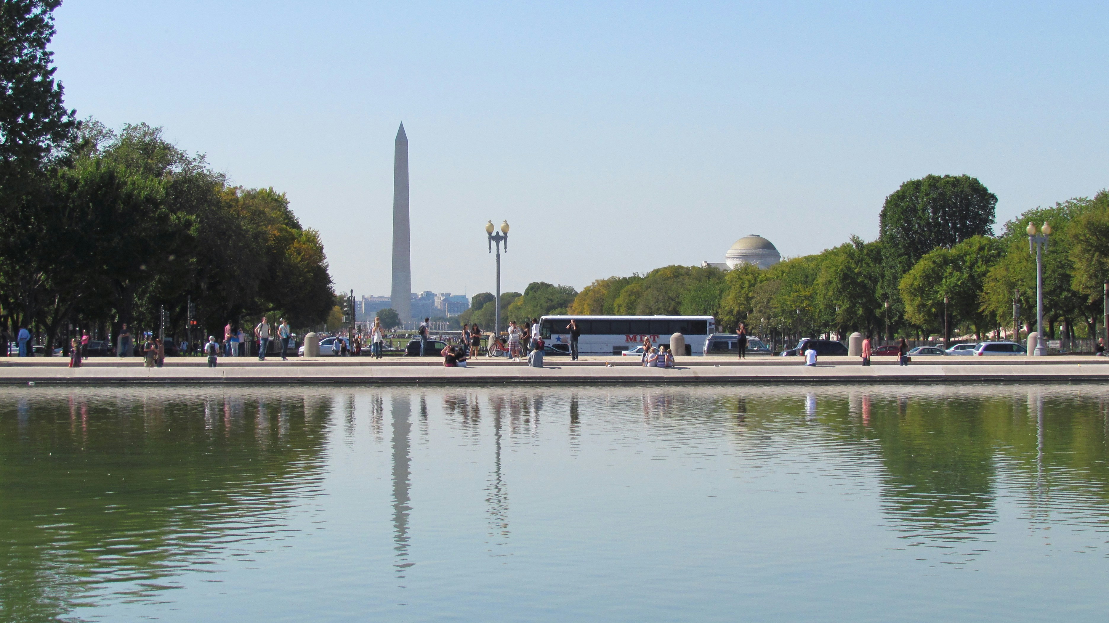 a large body of water in front of a monument