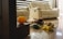 A cozy living room with soft blankets and sensory toys scattered around.