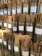 a bunch of cinnamon sticks in a glass jar