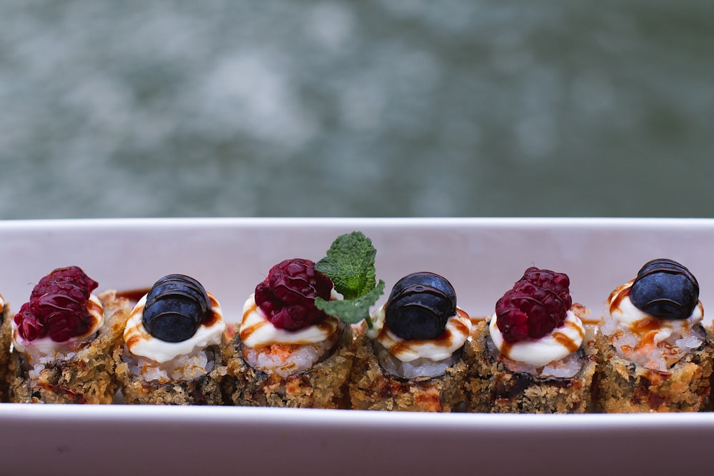 a plate of food with fruit on top of it