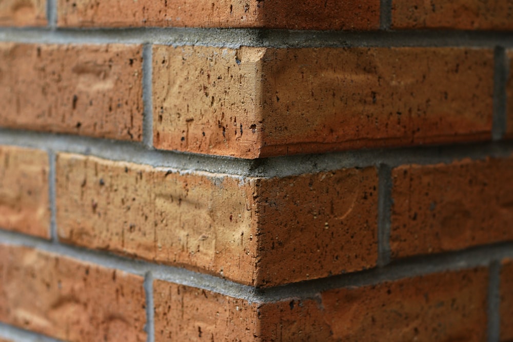 a close up of a brick wall made of bricks