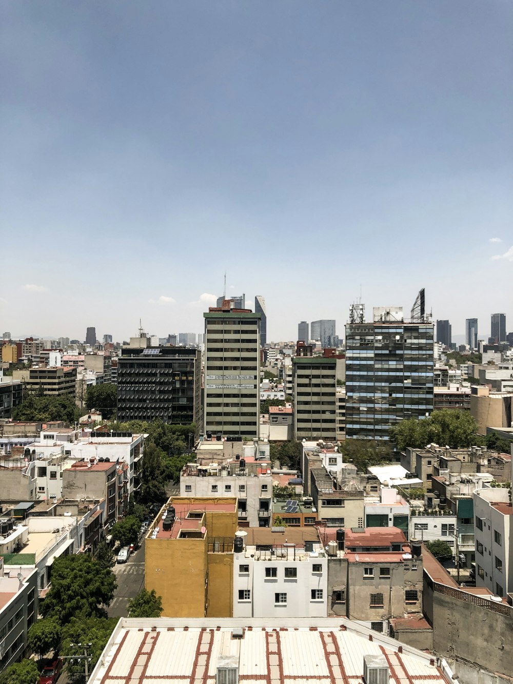 a view of a city from a tall building