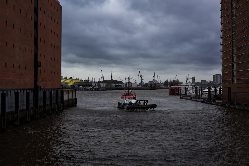 a boat is docked next to a body of water