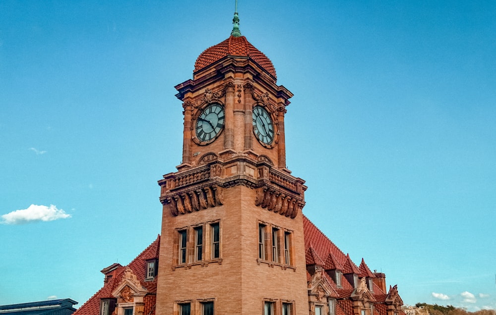 a large building with a clock on the top of it