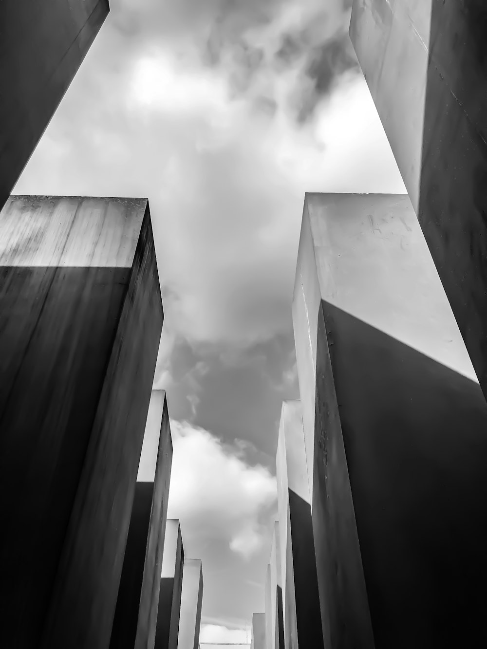 a black and white photo of a group of buildings