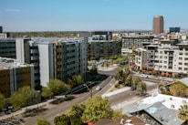 a view of a city with tall buildings