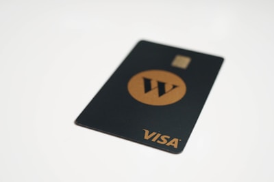 a visa card sitting on top of a white table