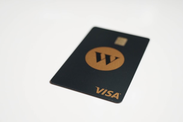 a visa card sitting on top of a white table