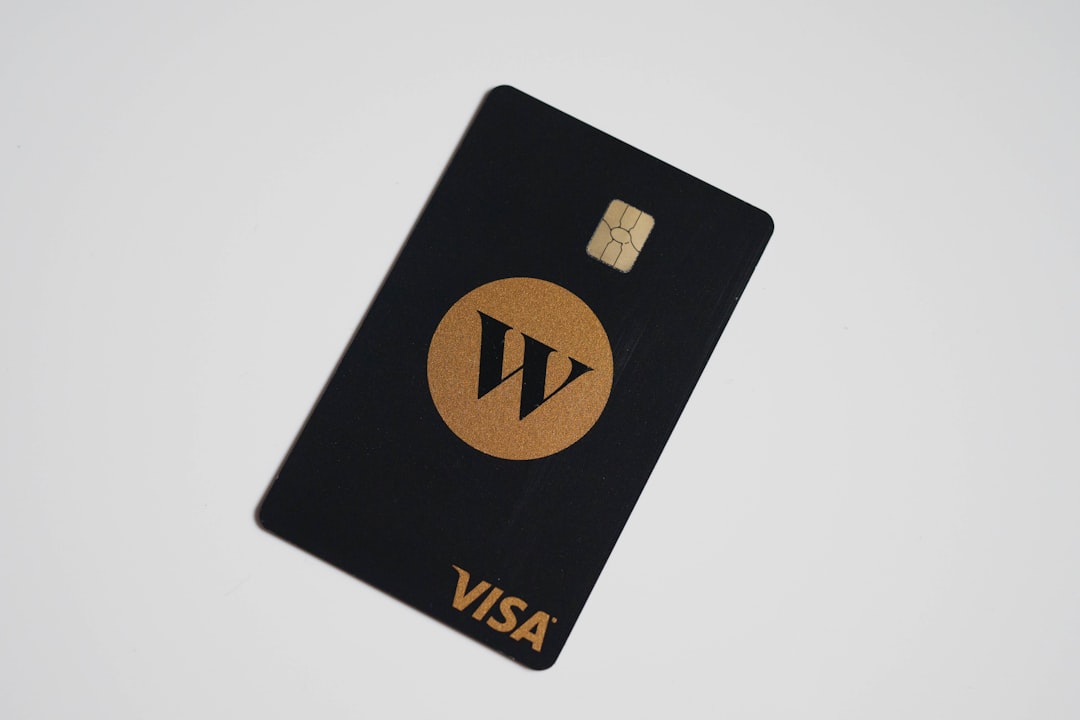 a visa card sitting on top of a white table