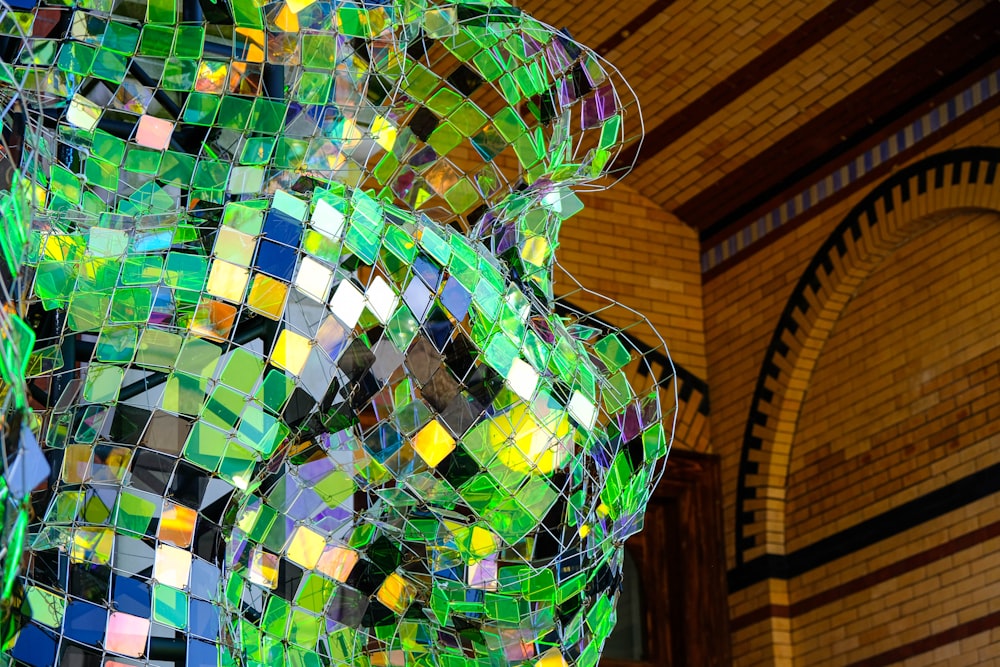 a sculpture of a bear made out of stained glass